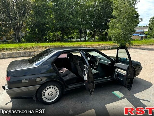 Чорний Альфа Ромео 164, об'ємом двигуна 2 л та пробігом 319 тис. км за 2000 $, фото 4 на Automoto.ua