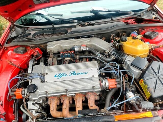 Красный Альфа Ромео 164, объемом двигателя 2 л и пробегом 100 тыс. км за 2000 $, фото 5 на Automoto.ua
