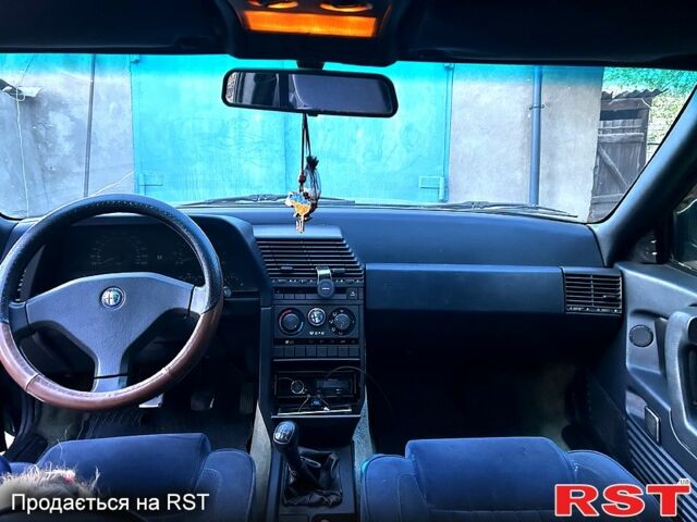 Зелений Альфа Ромео 164, об'ємом двигуна 2 л та пробігом 380 тис. км за 1650 $, фото 9 на Automoto.ua