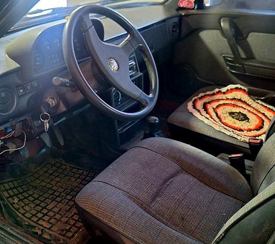 Черный Альфа Ромео 33, объемом двигателя 1.7 л и пробегом 0 тыс. км за 380 $, фото 2 на Automoto.ua