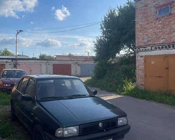 Черный Альфа Ромео 33, объемом двигателя 1.71 л и пробегом 226 тыс. км за 998 $, фото 2 на Automoto.ua