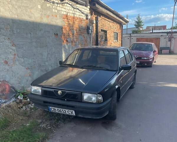 Черный Альфа Ромео 33, объемом двигателя 1.71 л и пробегом 226 тыс. км за 998 $, фото 6 на Automoto.ua
