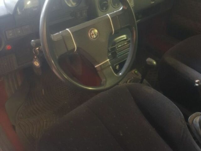 Красный Альфа Ромео 33, объемом двигателя 1 л и пробегом 111 тыс. км за 5000 $, фото 1 на Automoto.ua