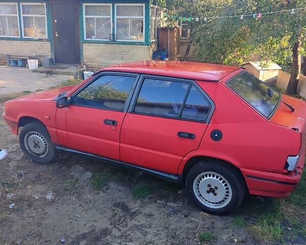 Красный Альфа Ромео 33, объемом двигателя 0.11 л и пробегом 180 тыс. км за 250 $, фото 2 на Automoto.ua