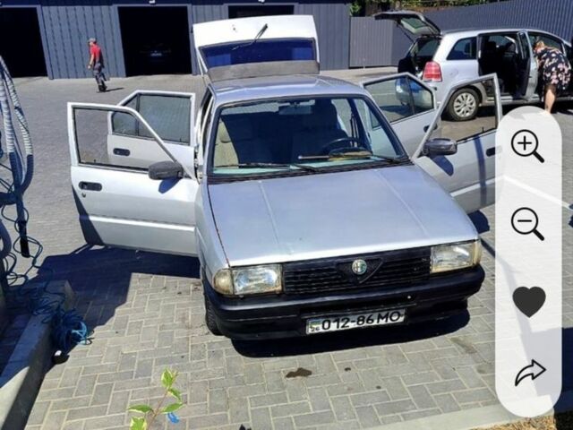 Сірий Альфа Ромео 33, об'ємом двигуна 1.5 л та пробігом 333 тис. км за 1000 $, фото 13 на Automoto.ua