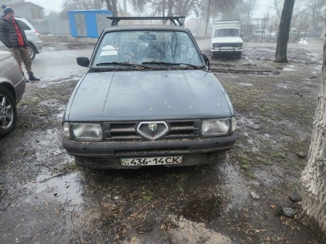 Серый Альфа Ромео 33, объемом двигателя 1.4 л и пробегом 400 тыс. км за 720 $, фото 3 на Automoto.ua