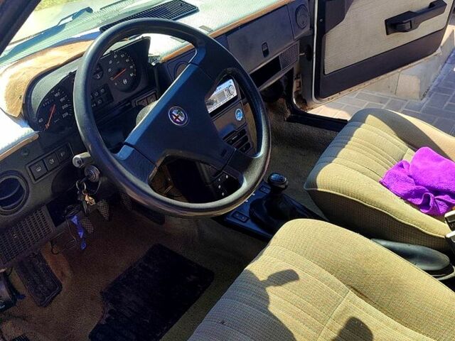 Сірий Альфа Ромео 33, об'ємом двигуна 1.6 л та пробігом 425 тис. км за 800 $, фото 11 на Automoto.ua