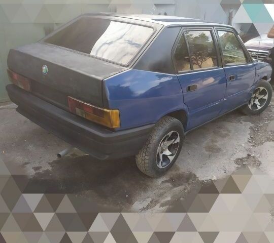 Синий Альфа Ромео 33, объемом двигателя 1.7 л и пробегом 228 тыс. км за 502 $, фото 4 на Automoto.ua