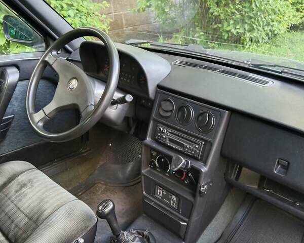 Зелений Альфа Ромео 33, об'ємом двигуна 1.7 л та пробігом 210 тис. км за 1500 $, фото 2 на Automoto.ua