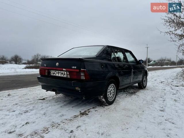 Чорний Альфа Ромео 75, об'ємом двигуна 1.8 л та пробігом 204 тис. км за 1700 $, фото 4 на Automoto.ua