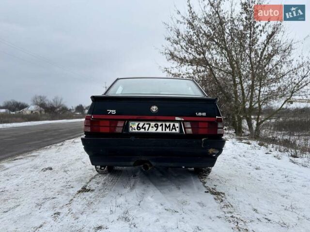 Чорний Альфа Ромео 75, об'ємом двигуна 1.8 л та пробігом 204 тис. км за 1700 $, фото 3 на Automoto.ua