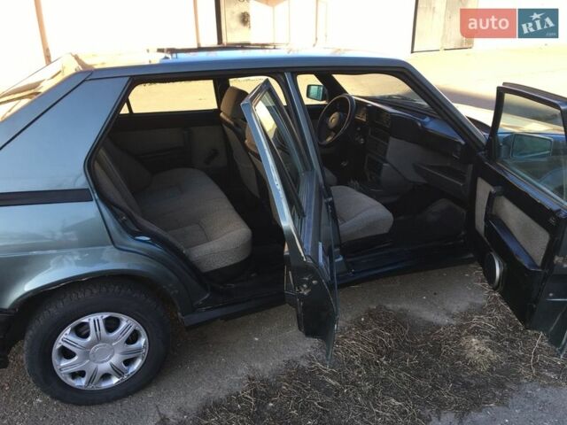 Серый Альфа Ромео 75, объемом двигателя 1.6 л и пробегом 200 тыс. км за 900 $, фото 6 на Automoto.ua