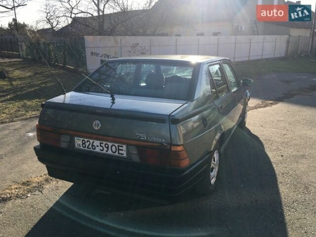 Серый Альфа Ромео 75, объемом двигателя 1.6 л и пробегом 200 тыс. км за 900 $, фото 13 на Automoto.ua