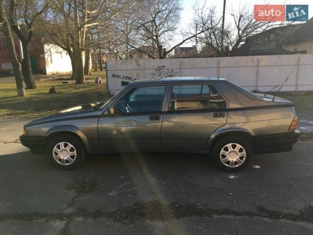 Серый Альфа Ромео 75, объемом двигателя 1.6 л и пробегом 200 тыс. км за 900 $, фото 2 на Automoto.ua