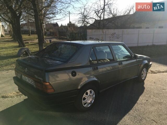 Серый Альфа Ромео 75, объемом двигателя 1.6 л и пробегом 200 тыс. км за 900 $, фото 3 на Automoto.ua