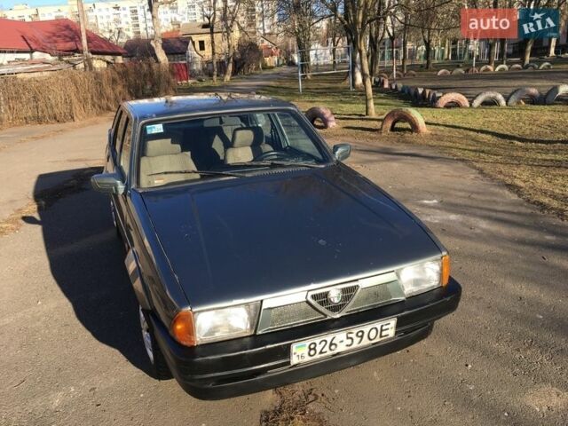 Серый Альфа Ромео 75, объемом двигателя 1.6 л и пробегом 200 тыс. км за 900 $, фото 1 на Automoto.ua