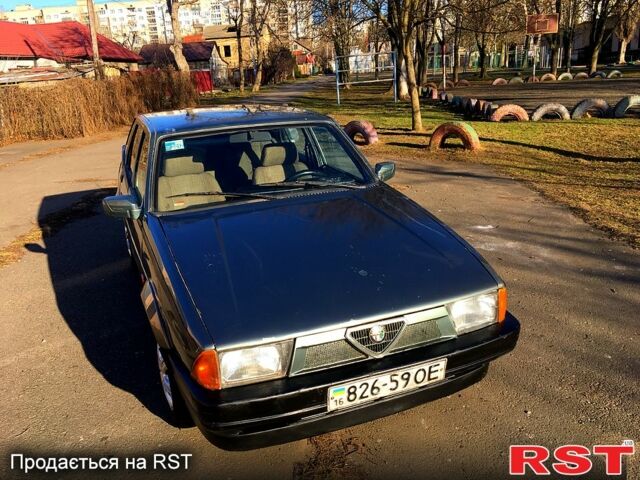 Сірий Альфа Ромео 75, об'ємом двигуна 1.6 л та пробігом 200 тис. км за 800 $, фото 1 на Automoto.ua