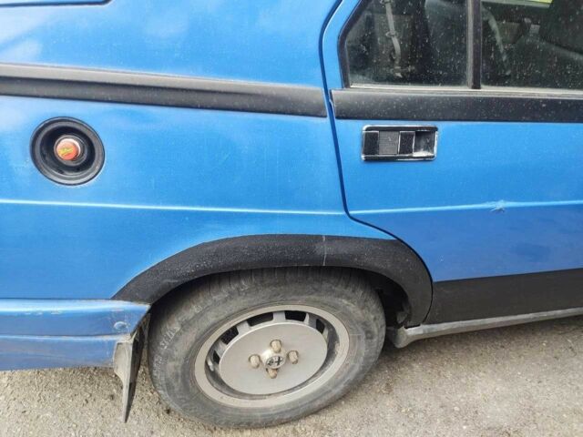 Синій Альфа Ромео 75, об'ємом двигуна 2 л та пробігом 3 тис. км за 953 $, фото 5 на Automoto.ua