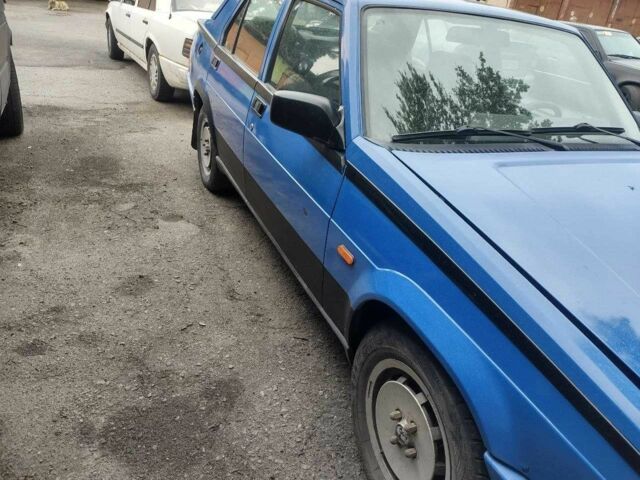 Синій Альфа Ромео 75, об'ємом двигуна 2 л та пробігом 3 тис. км за 953 $, фото 1 на Automoto.ua