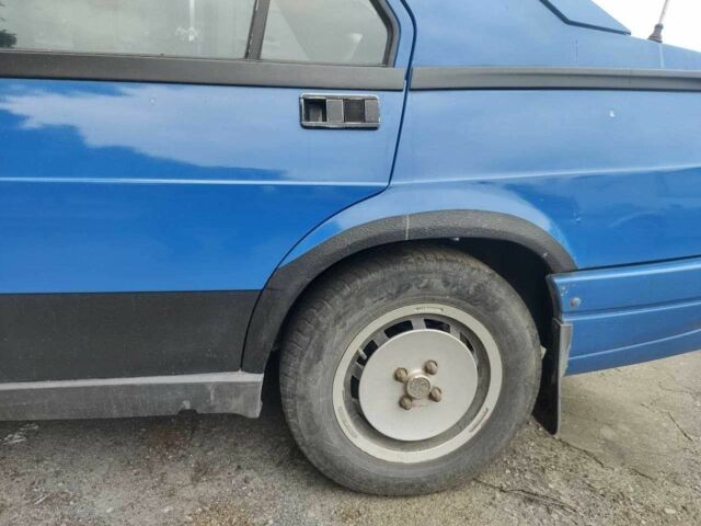 Синій Альфа Ромео 75, об'ємом двигуна 2 л та пробігом 3 тис. км за 953 $, фото 4 на Automoto.ua