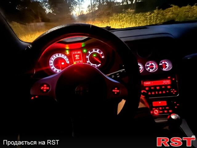 Червоний Альфа Ромео Brera, об'ємом двигуна 2.2 л та пробігом 200 тис. км за 7750 $, фото 4 на Automoto.ua