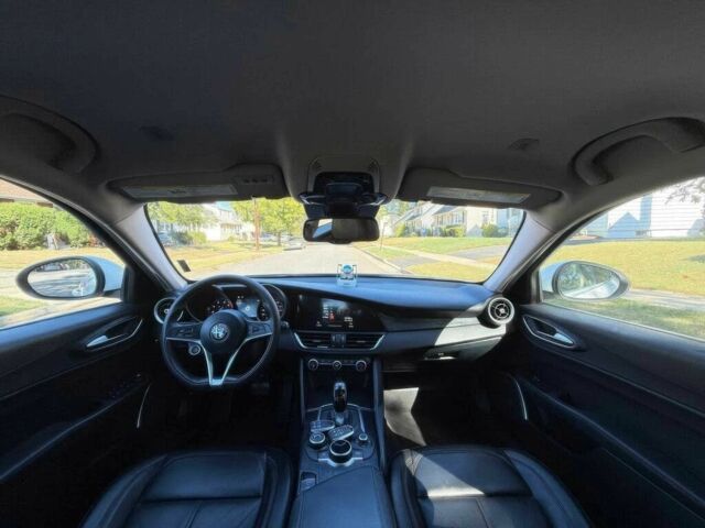 Белый Альфа Ромео Джулия, объемом двигателя 2 л и пробегом 47 тыс. км за 5000 $, фото 12 на Automoto.ua