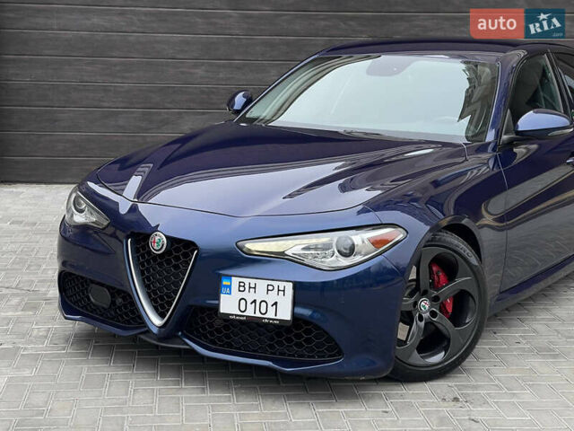 Синій Альфа Ромео Джулія, об'ємом двигуна 2 л та пробігом 126 тис. км за 19650 $, фото 1 на Automoto.ua