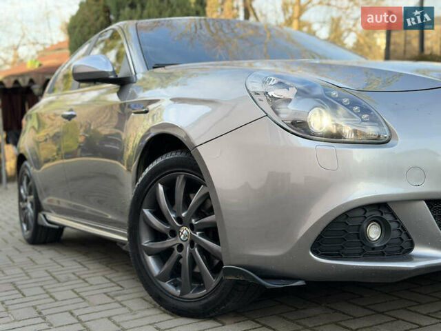Сірий Альфа Ромео Giulietta, об'ємом двигуна 1.96 л та пробігом 159 тис. км за 7950 $, фото 18 на Automoto.ua