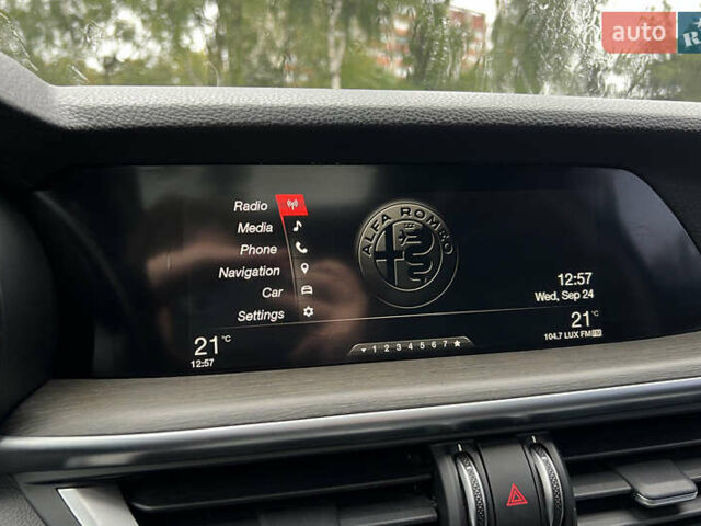 Білий Альфа Ромео Стелвіо, об'ємом двигуна 2 л та пробігом 112 тис. км за 16500 $, фото 16 на Automoto.ua