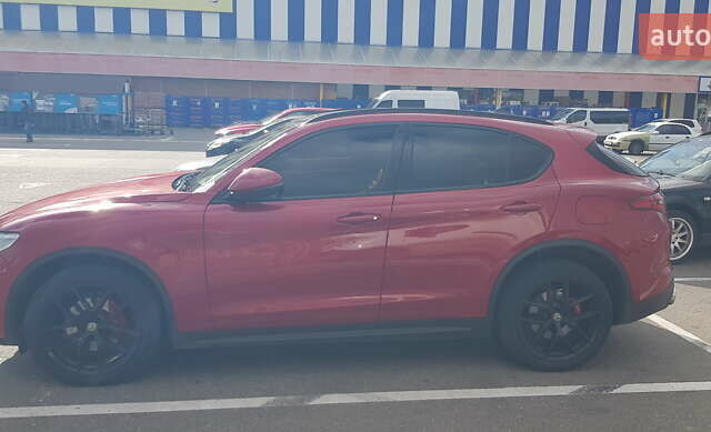 Червоний Альфа Ромео Стелвіо, об'ємом двигуна 2 л та пробігом 126 тис. км за 18700 $, фото 2 на Automoto.ua