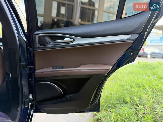 Синій Альфа Ромео Стелвіо, об'ємом двигуна 2 л та пробігом 145 тис. км за 18900 $, фото 58 на Automoto.ua