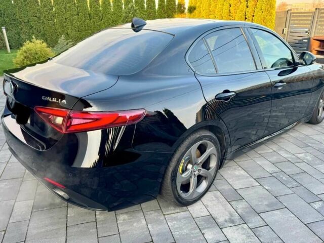 Черный Альфа Giulia, объемом двигателя 2 л и пробегом 54 тыс. км за 10900 $, фото 2 на Automoto.ua