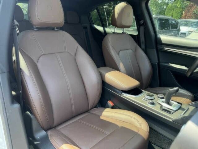 Білий Альфа stelvio, об'ємом двигуна 2 л та пробігом 29 тис. км за 16000 $, фото 6 на Automoto.ua