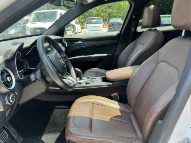 Білий Альфа stelvio, об'ємом двигуна 2 л та пробігом 29 тис. км за 16000 $, фото 7 на Automoto.ua