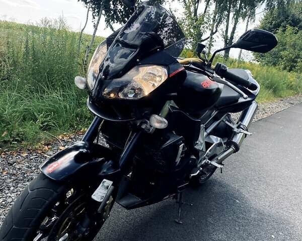 Априлия Tuono 1000 R 2011 в Луцке на Automoto.ua Черный Априлия Tuono 1000 R, объемом двигателя 1 л и пробегом 27 тыс. км за 2500 $, фото 3 на Automoto.ua