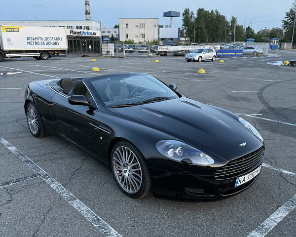 Черный Астон Мартин ДБ9, объемом двигателя 5.94 л и пробегом 54 тыс. км за 62000 $, фото 3 на Automoto.ua