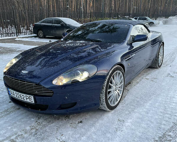 Синий Астон Мартин ДБ9, объемом двигателя 6 л и пробегом 64 тыс. км за 58000 $, фото 24 на Automoto.ua