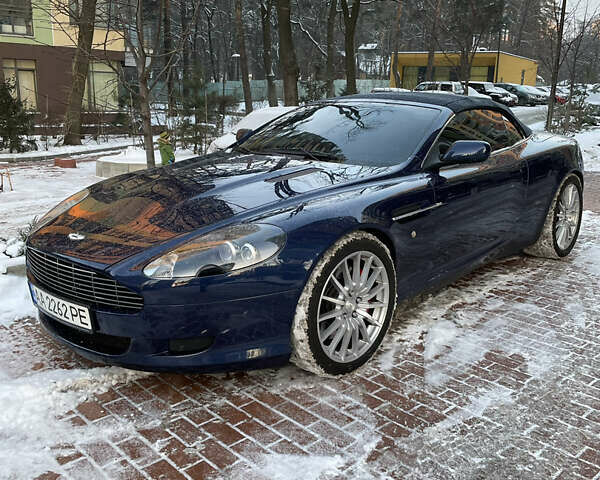 Синий Астон Мартин ДБ9, объемом двигателя 6 л и пробегом 64 тыс. км за 58000 $, фото 18 на Automoto.ua