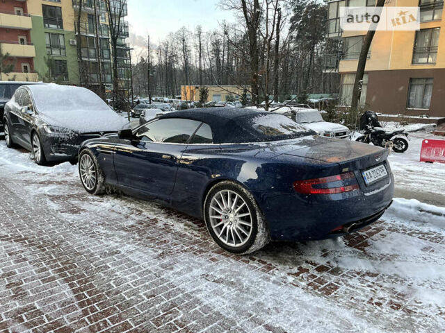 Синий Астон Мартин ДБ9, объемом двигателя 6 л и пробегом 64 тыс. км за 58000 $, фото 17 на Automoto.ua