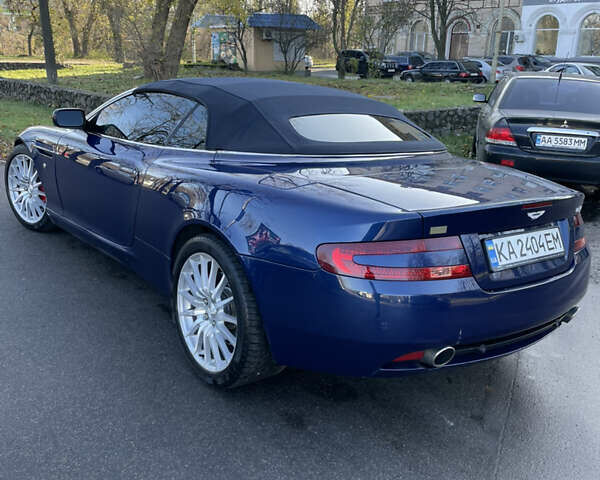 Синий Астон Мартин ДБ9, объемом двигателя 6 л и пробегом 64 тыс. км за 58000 $, фото 2 на Automoto.ua