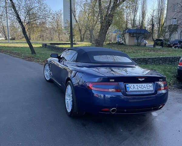 Синий Астон Мартин ДБ9, объемом двигателя 6 л и пробегом 64 тыс. км за 58000 $, фото 4 на Automoto.ua