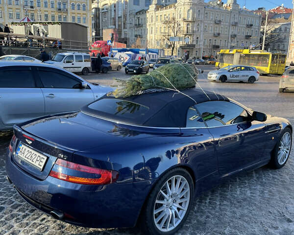 Синий Астон Мартин ДБ9, объемом двигателя 6 л и пробегом 64 тыс. км за 58000 $, фото 14 на Automoto.ua
