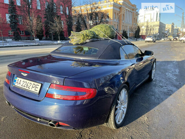 Синий Астон Мартин ДБ9, объемом двигателя 6 л и пробегом 64 тыс. км за 58000 $, фото 16 на Automoto.ua
