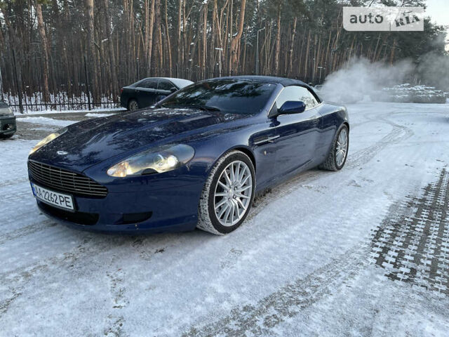 Синий Астон Мартин ДБ9, объемом двигателя 6 л и пробегом 64 тыс. км за 58000 $, фото 23 на Automoto.ua