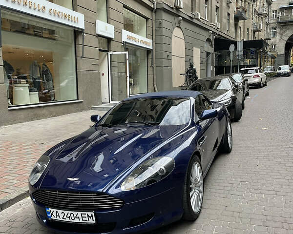 Синий Астон Мартин ДБ9, объемом двигателя 6 л и пробегом 64 тыс. км за 58000 $, фото 9 на Automoto.ua