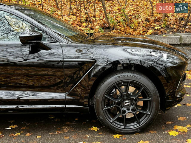 Черный Астон Мартин DBX, объемом двигателя 3.98 л и пробегом 63 тыс. км за 132000 $, фото 32 на Automoto.ua