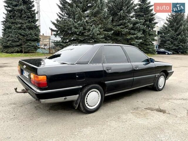 Черный Ауди 100, объемом двигателя 1.8 л и пробегом 384 тыс. км за 1800 $, фото 1 на Automoto.ua