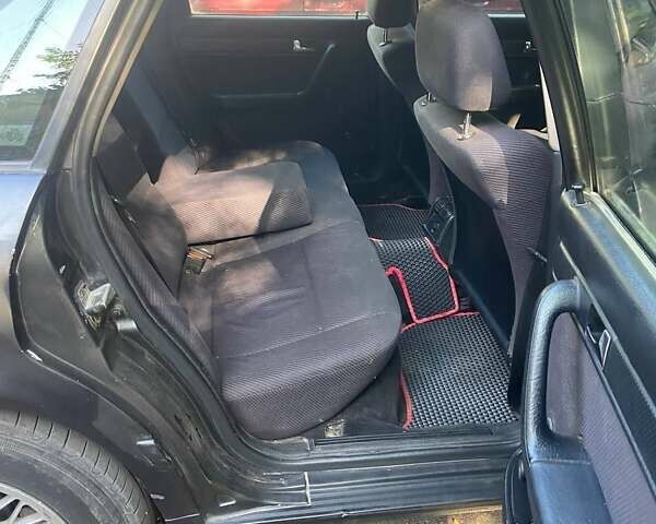 Черный Ауди 100, объемом двигателя 2.6 л и пробегом 400 тыс. км за 3000 $, фото 5 на Automoto.ua