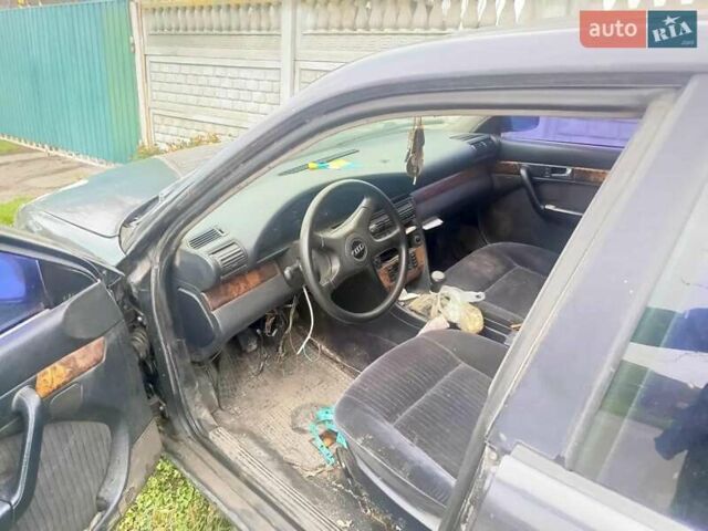 Черный Ауди 100, объемом двигателя 2.8 л и пробегом 400 тыс. км за 1700 $, фото 1 на Automoto.ua