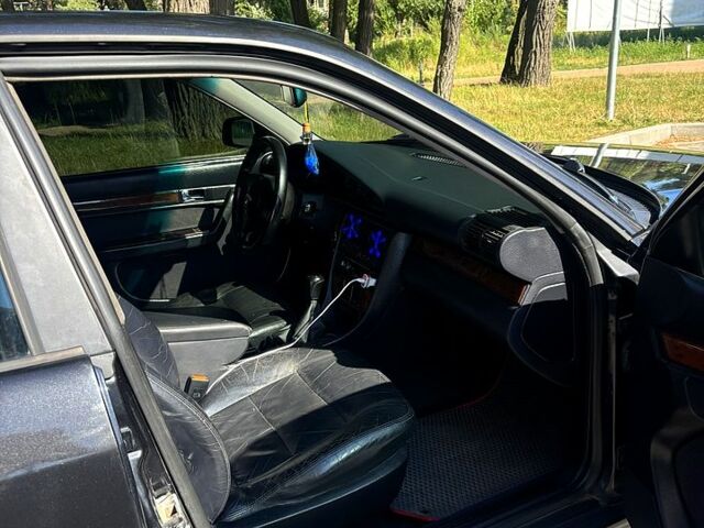 Черный Ауди 100, объемом двигателя 2.6 л и пробегом 321 тыс. км за 2999 $, фото 2 на Automoto.ua